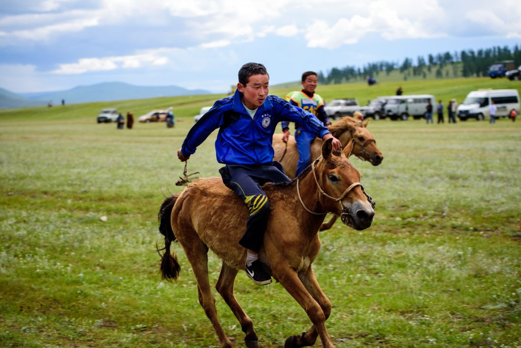 riding horses in Mongolia