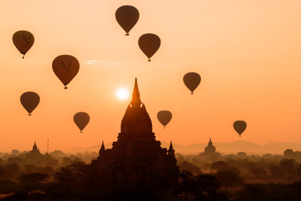 Sunrise in Bagan Myanmar. Hot Air Balloons and pagodas