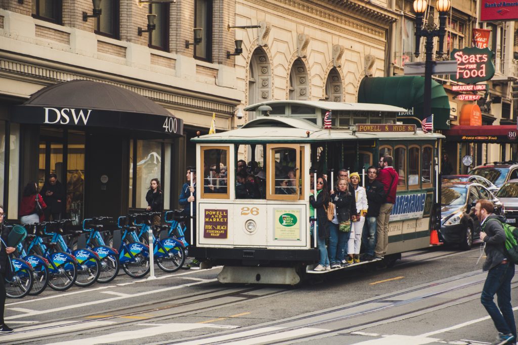 Tourists on group tour on cable car